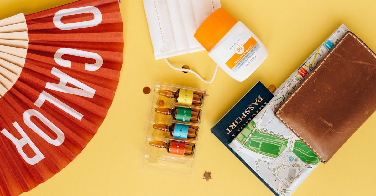 Flat lay of various SPF lip balms and lip sunscreen sticks on a white surface with sunscreen tube, summer sun protection products, minimalist lifestyle photography, natural daylight