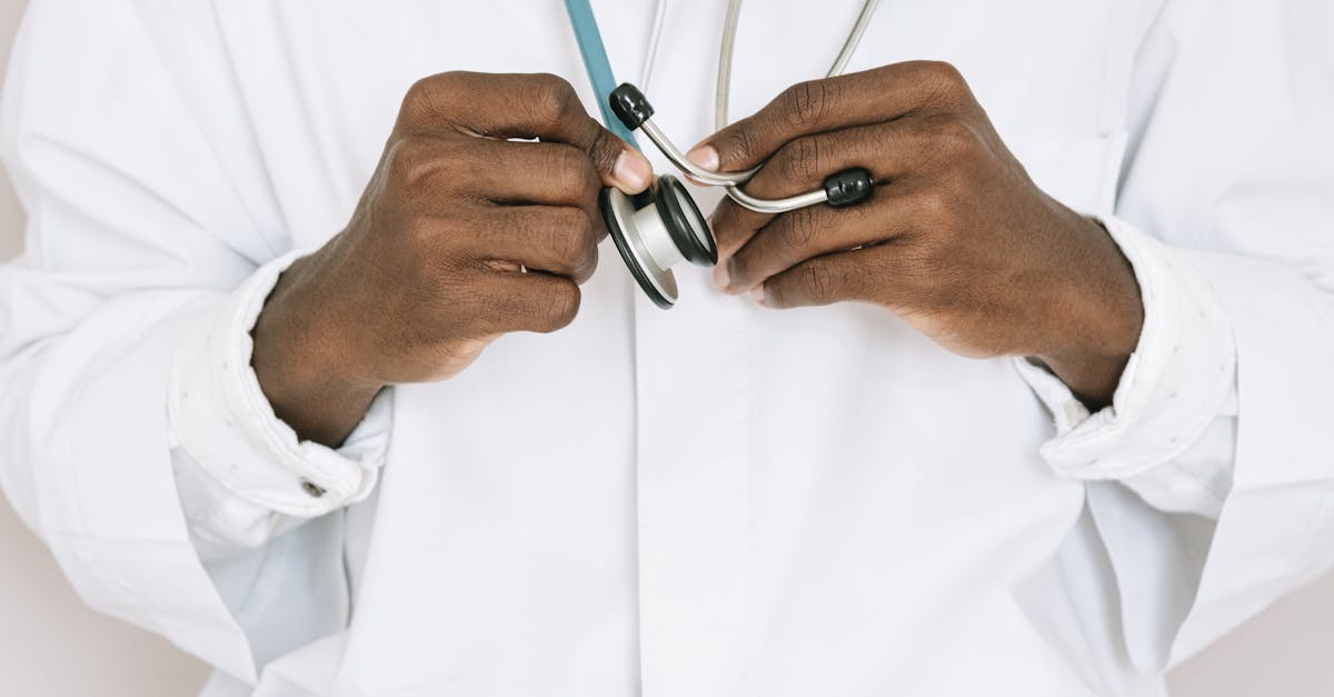 Close-up of a doctor or nurse explaining something to a patient in a bright medical office, both looking calm and attentive, health consultation concept, realistic stock photo photography