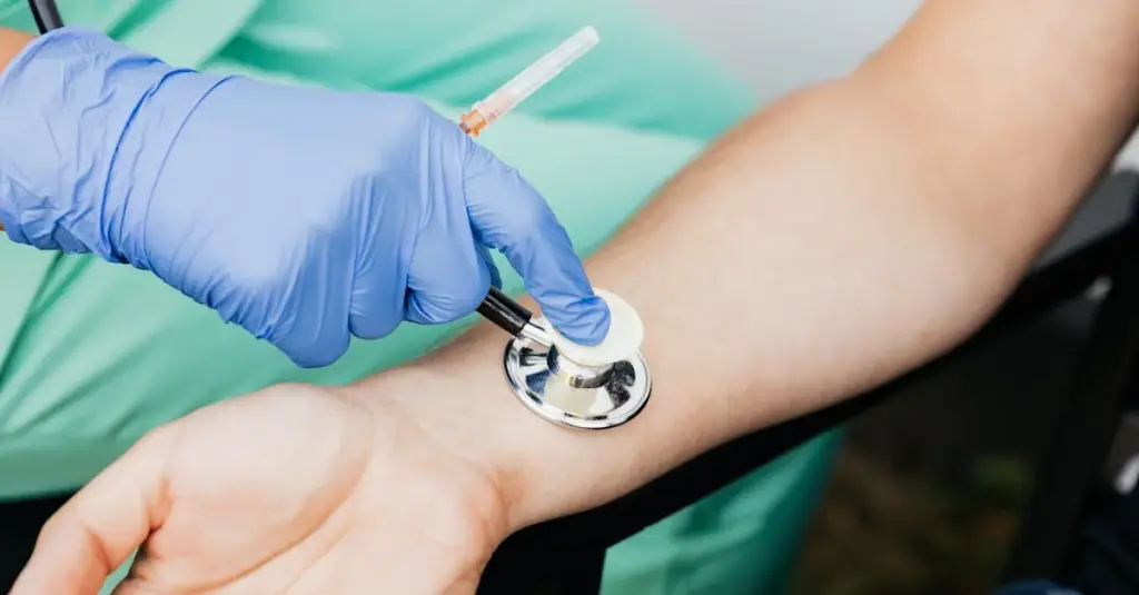 A close-up of a doctor's hand holding a blood test tube with red blood cells illustration overlay, medical laboratory background, anemia diagnosis concept, realistic clinical photography