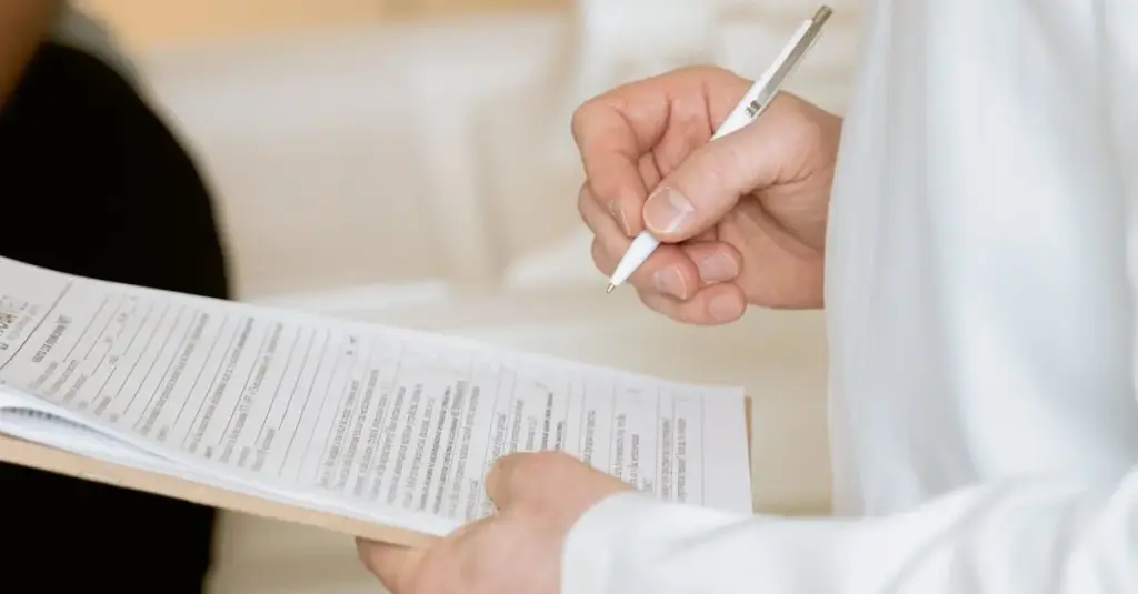 A doctor reviewing blood test results on a tablet with a patient sitting across the desk, modern clinic setting, natural light, medical diagnosis concept, realistic stock photography